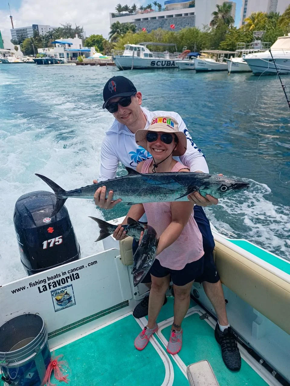 Anglers showing their catch after a fishing trip